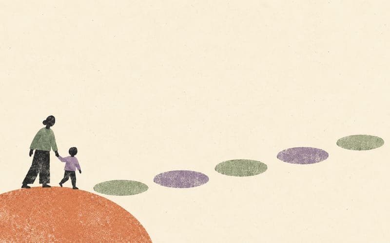 A child and supporting adult at the beginning of a sequence of widely spaced stepping stones on cream paper