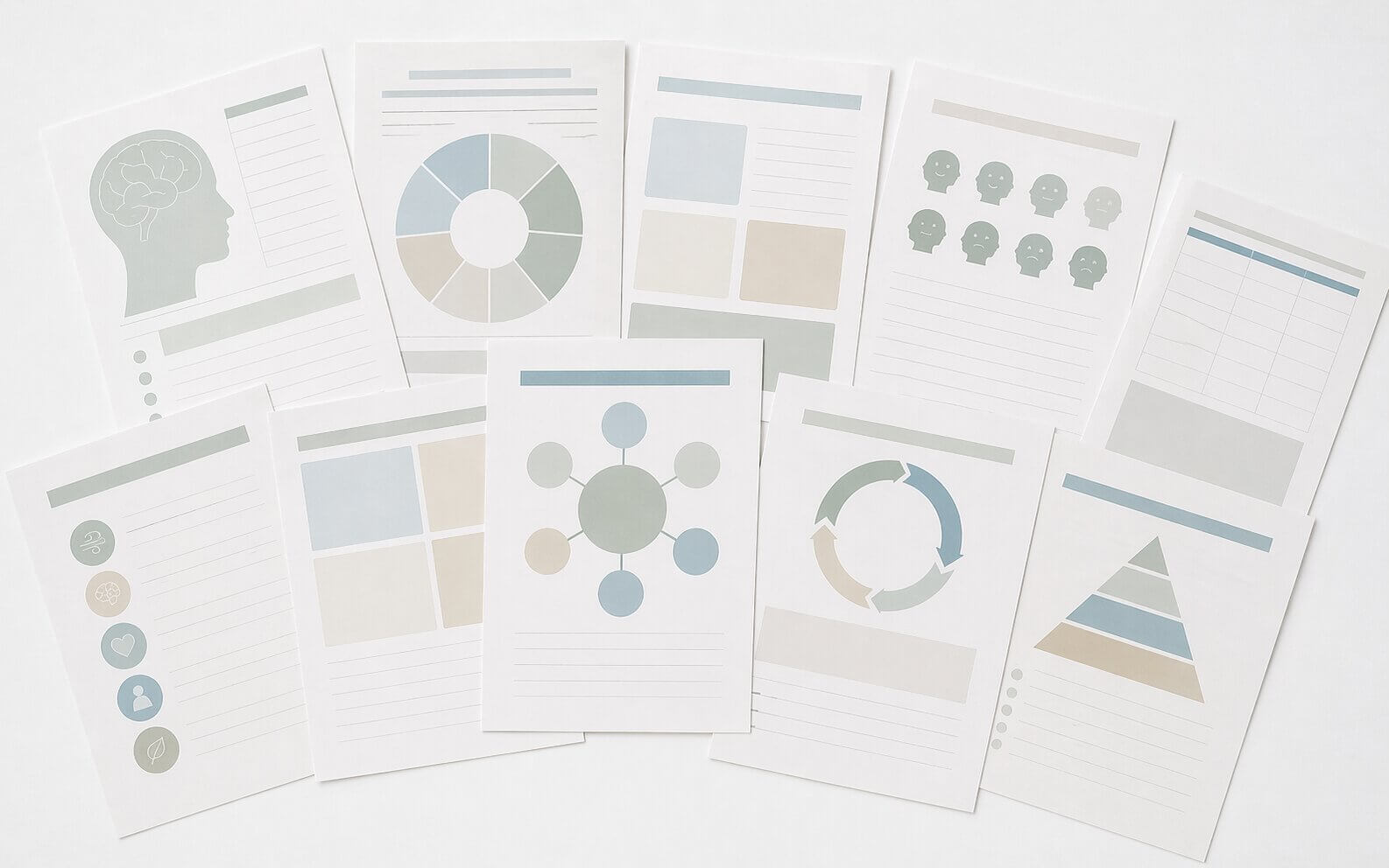 Flat lay of psychology worksheets and therapy resources for Australian clinicians