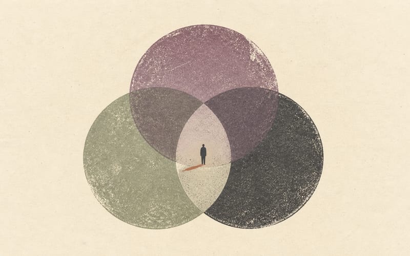 A tiny figure within several large overlapping rings, representing the simultaneous demands involved in participating in therapy